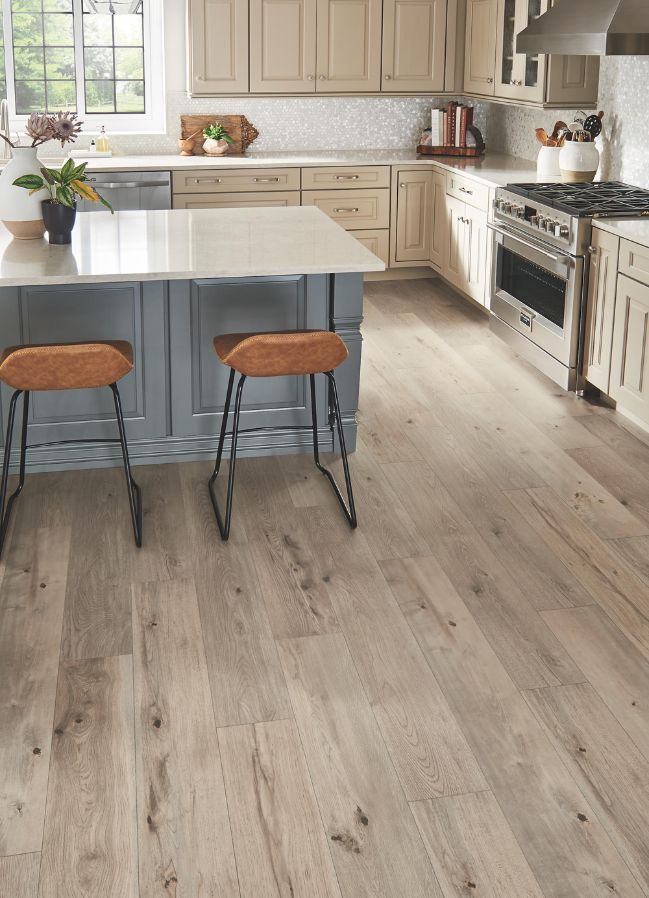 wood look laminate floors in a charming ktichen